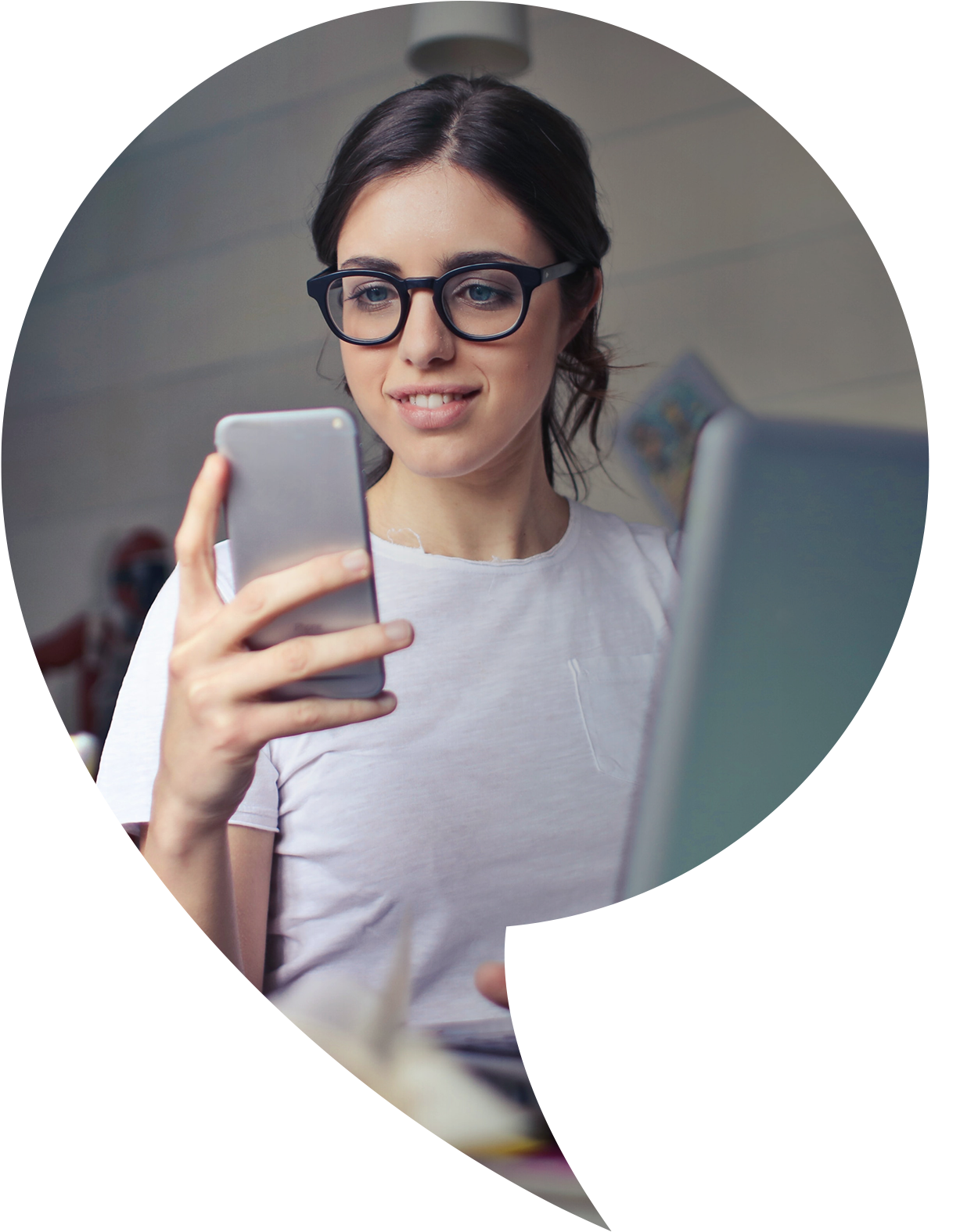 Young woman looking at her mobile phone