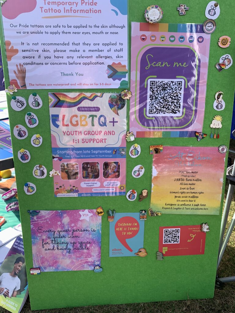 Information pin board at Eikon Pride in Surrey stall